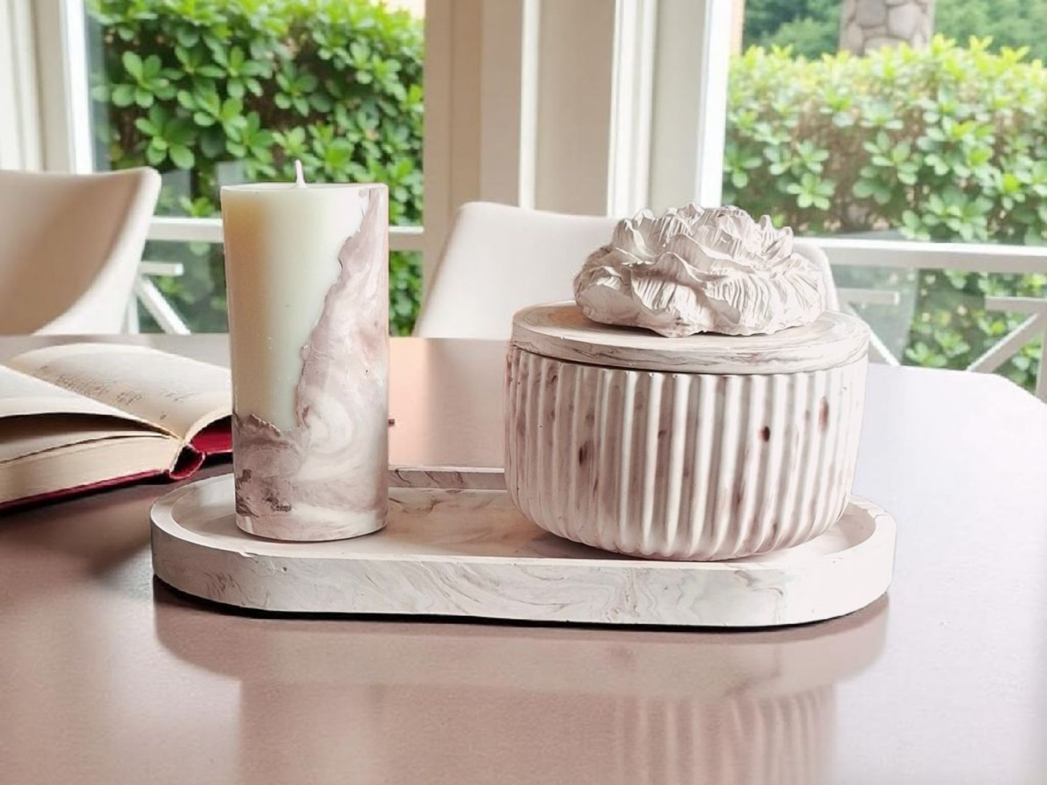 Minimalist handmade candle in gypsum container, sustainable soy wax.