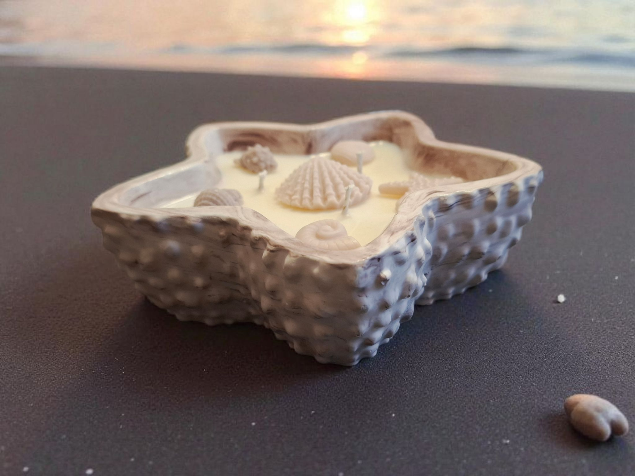 Minimalist handmade candle in gypsum container, sustainable soy wax.