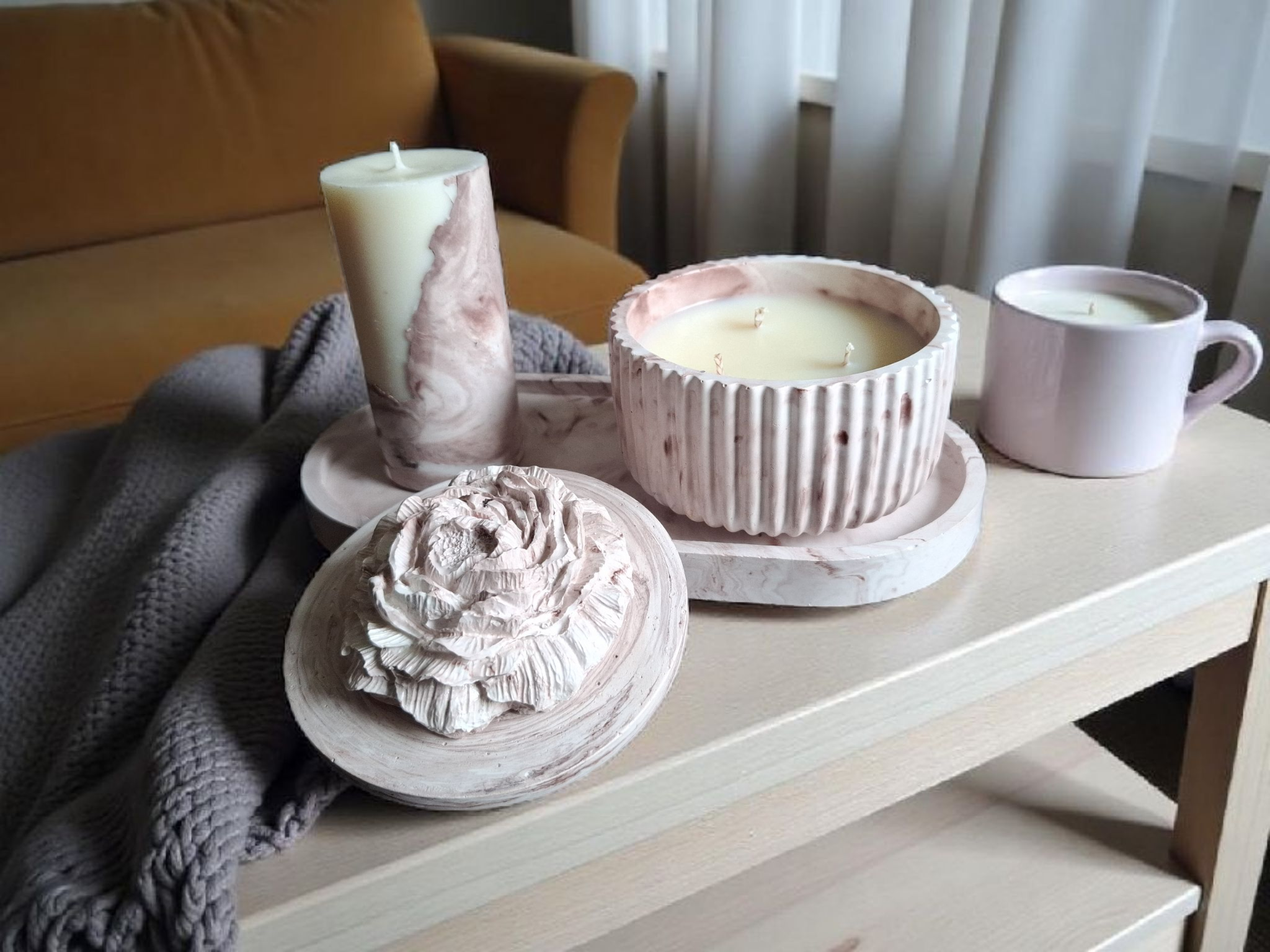 Minimalist handmade candle in gypsum container, sustainable soy wax.